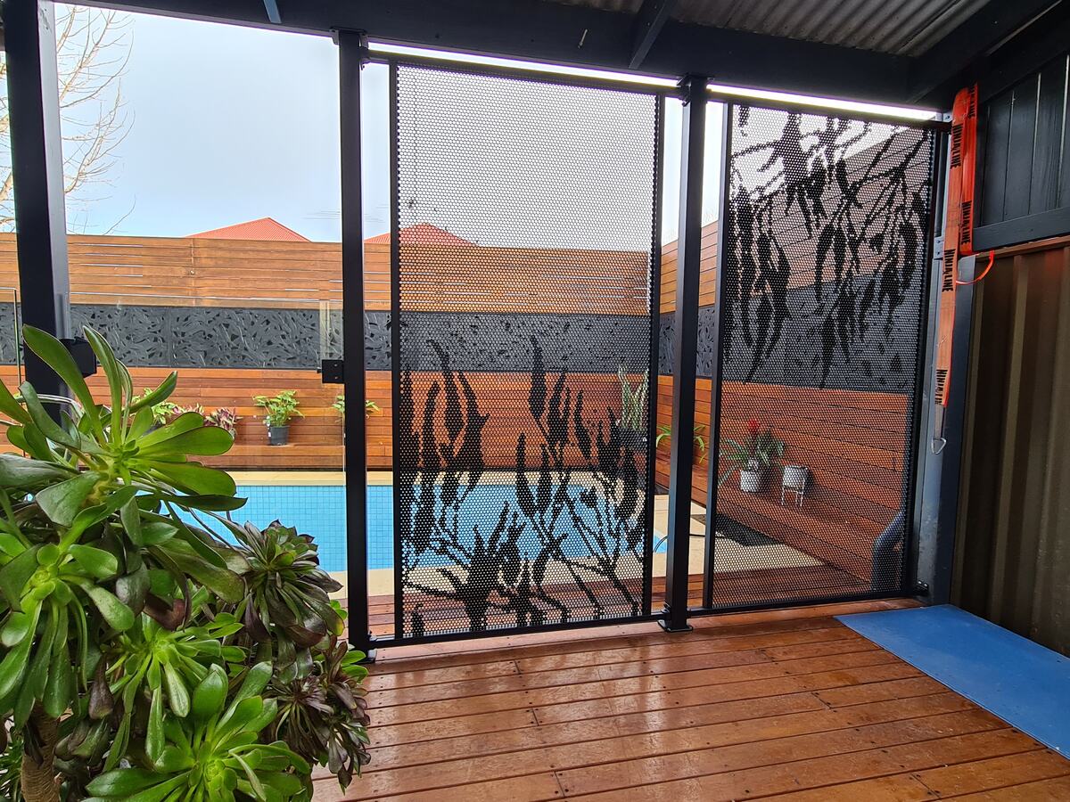 Gum design pool fencing in Textured Black beside a timber deck, SA